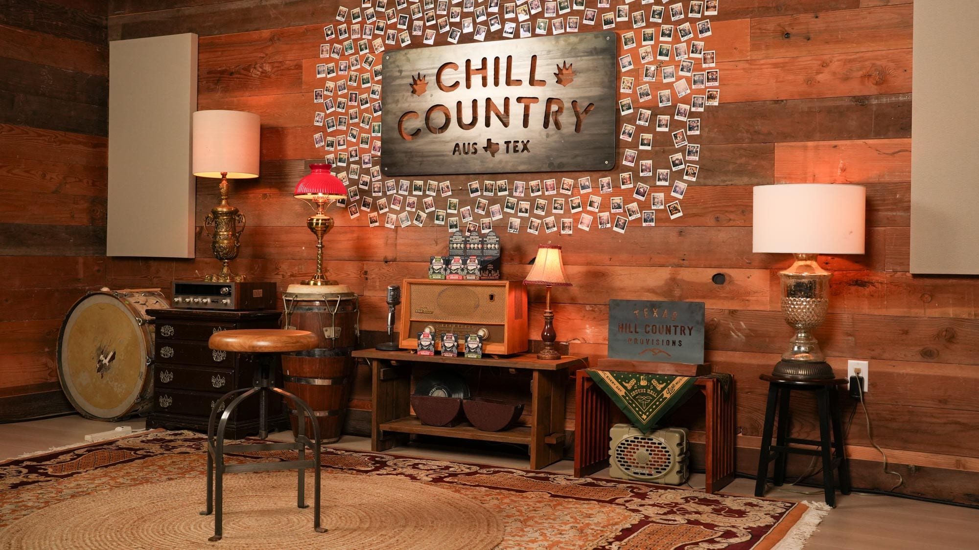 The Chill Country Sessions room: the Chill Country sign ringed with Polaroids of the artists who have played there, lamps, a vintage radio and a stool